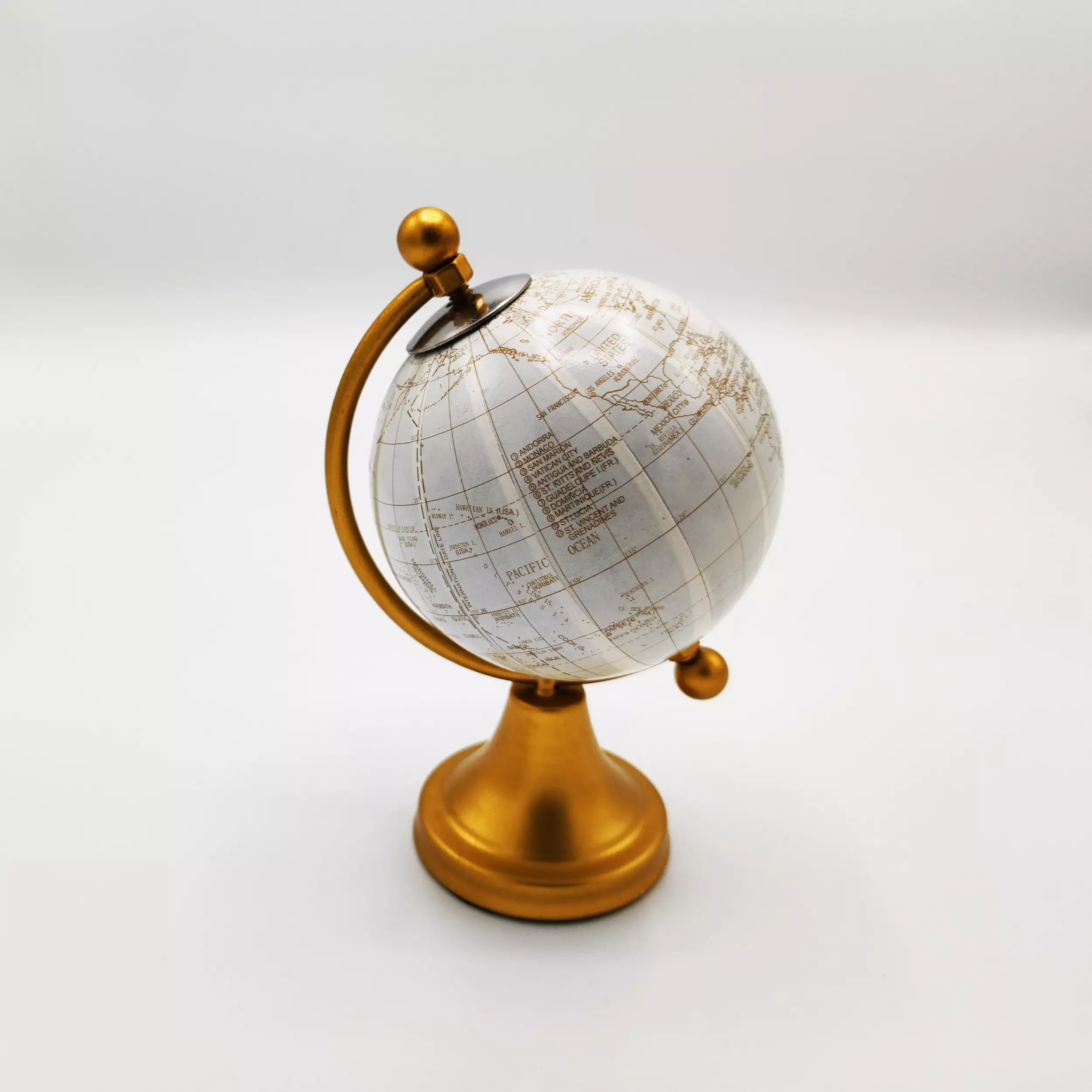Premium Decorative White Globe with Metal Stand on a light background.