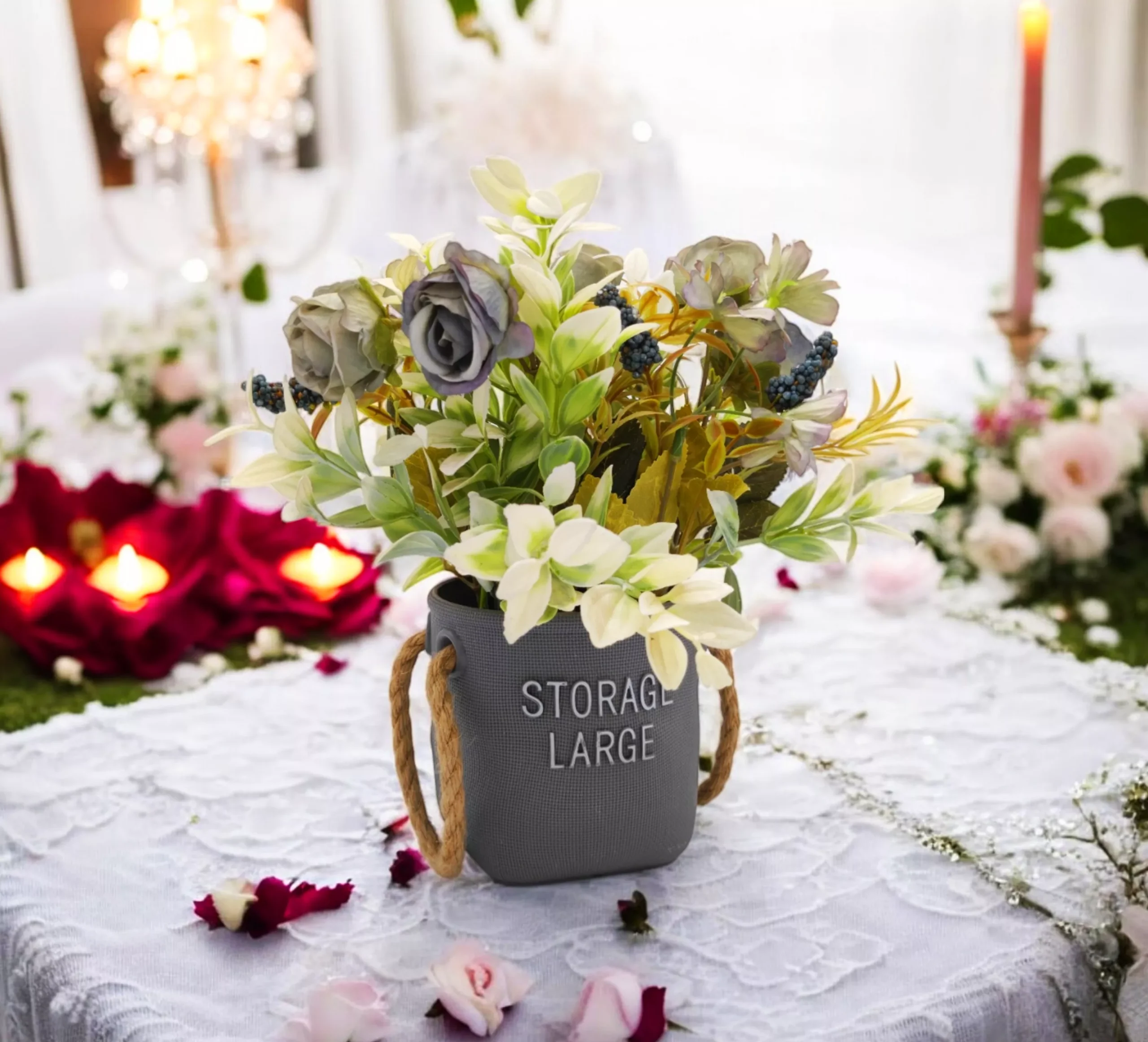 Artificial flowers in a Stoarge Large pot on a decorated table.