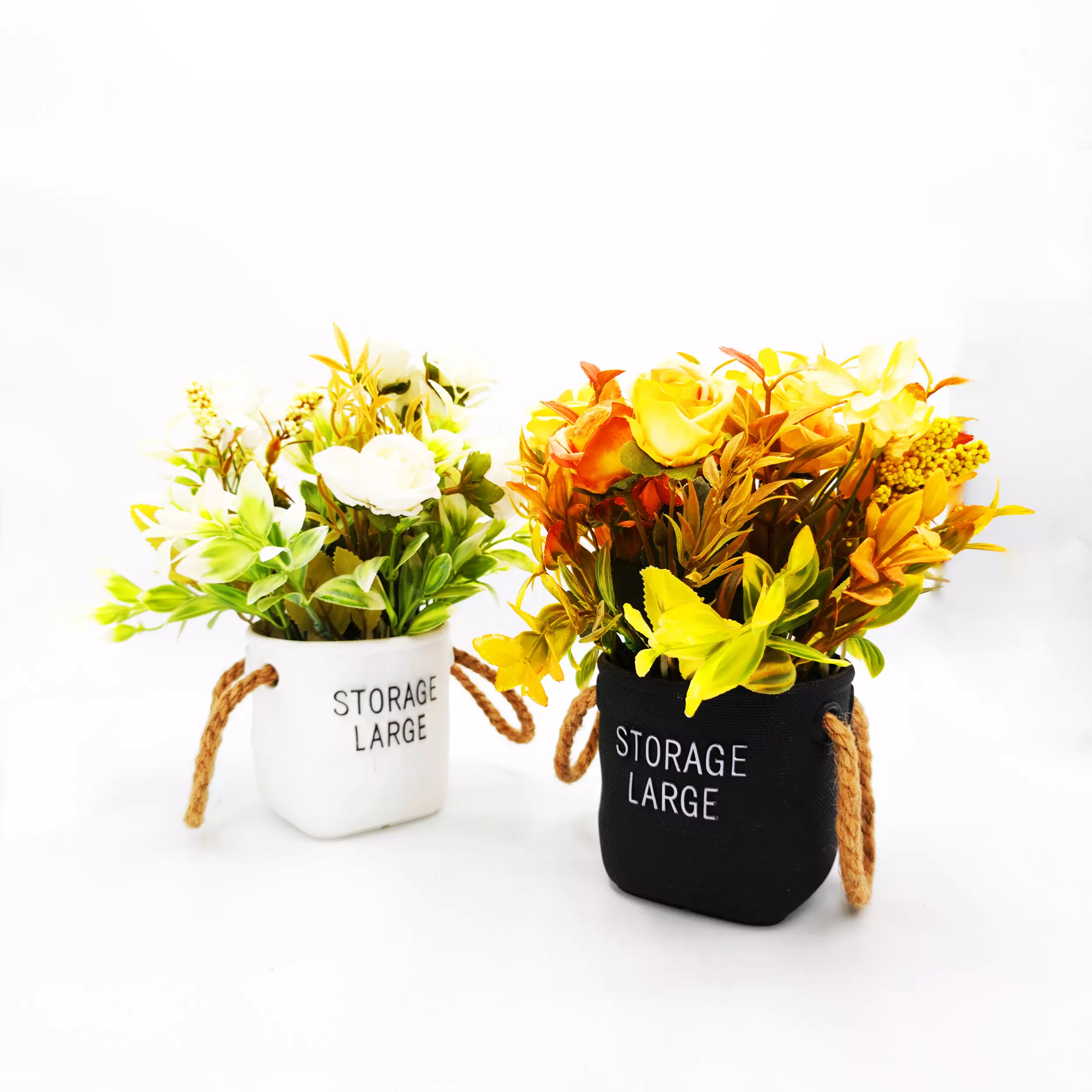 Two artificial flower arrangements in pots labeled storage large